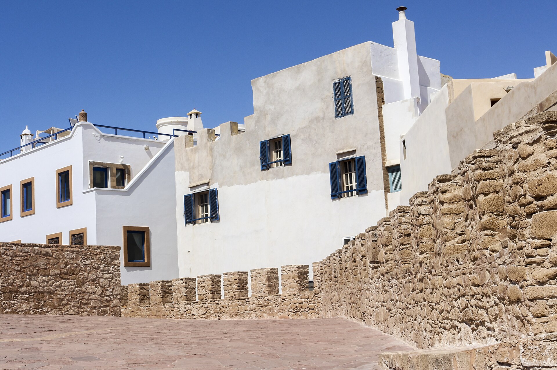 White and blue houses behind the ramparts of Essaouira